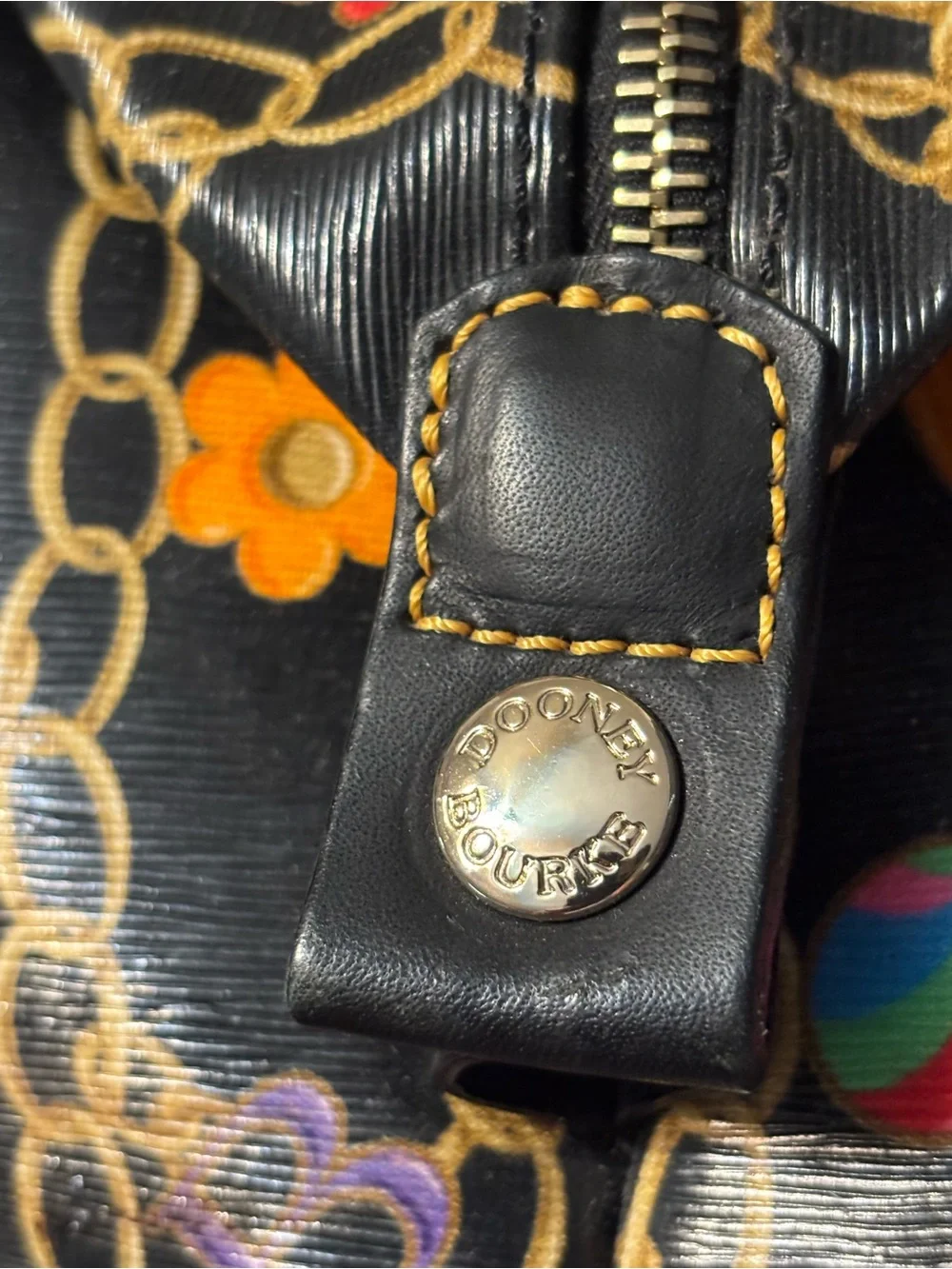 Dooney & Bourke Black Satchel with Multicolor Chain Charm Print